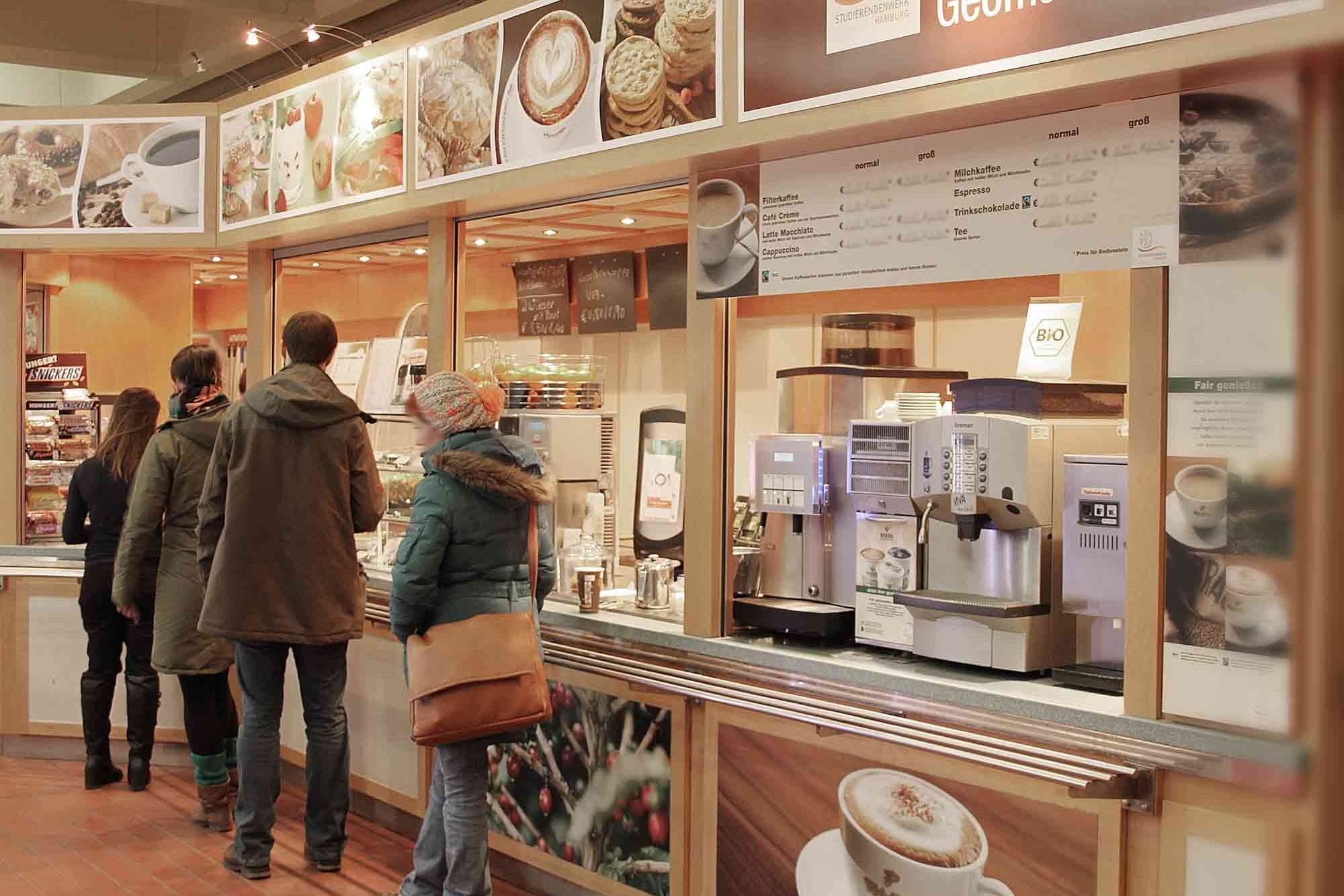 Sales counter with guests at Café Geomatikum