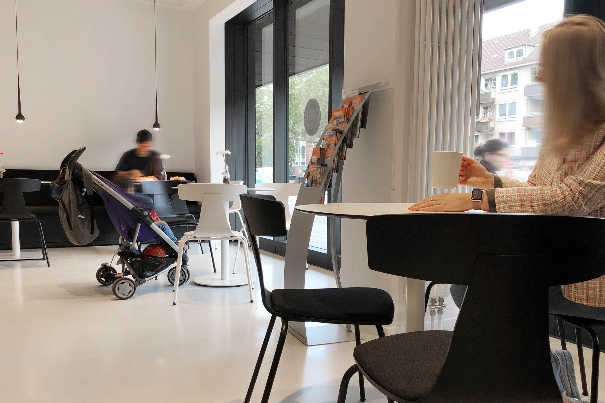 Café Grindel dining room with guests