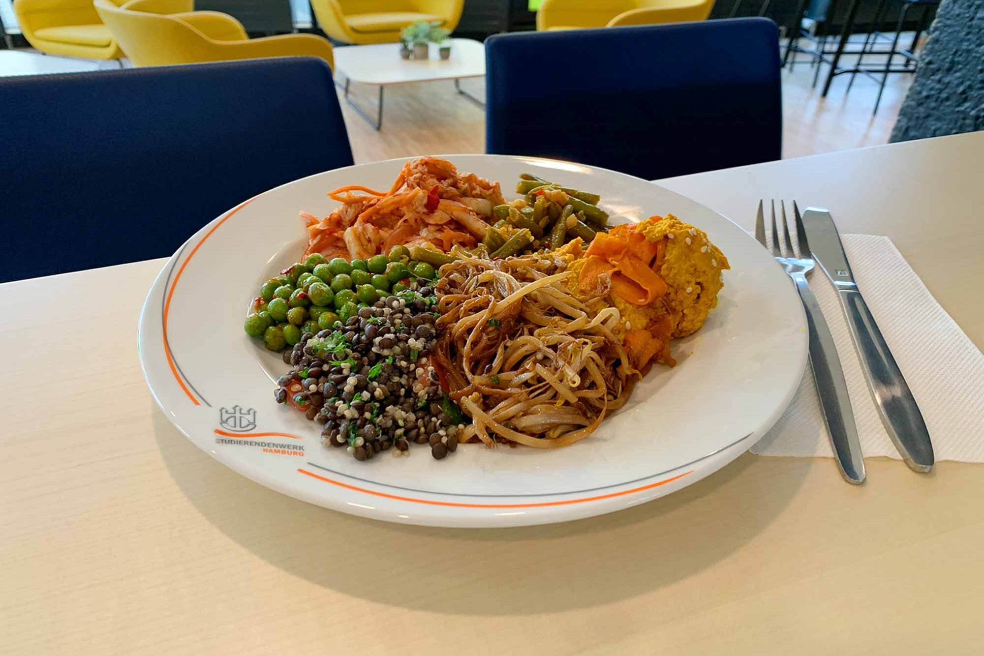 Plate with colourful vegetables in the Cafeteria Philturm