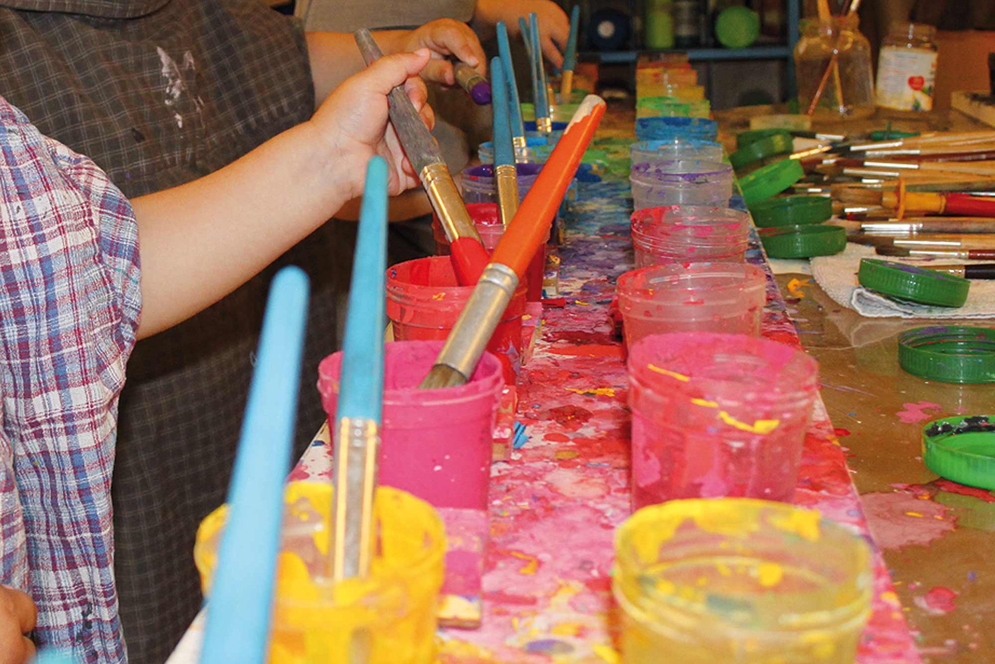 Children painting with watercolors