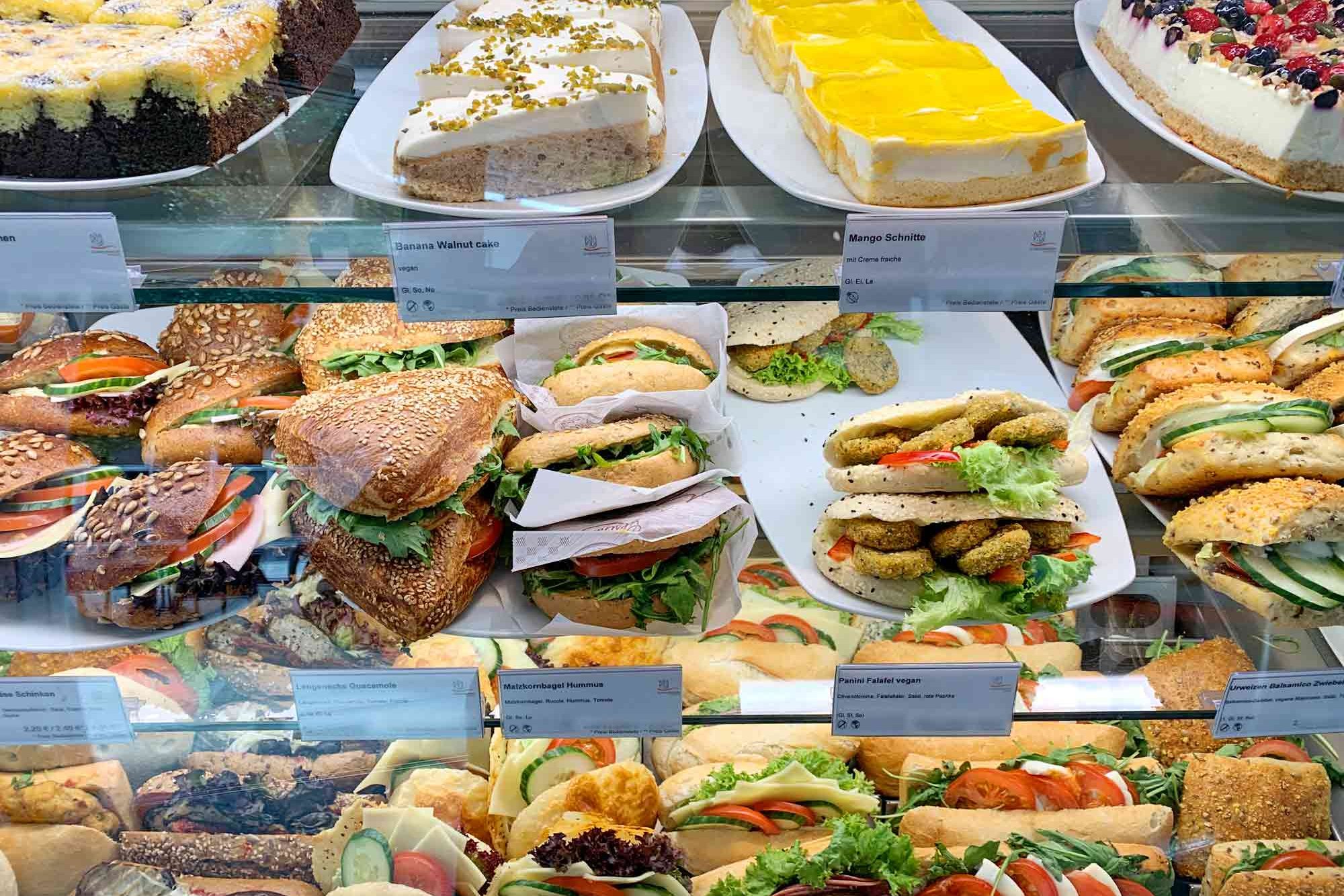 Savory and sweet baked goods in a display case