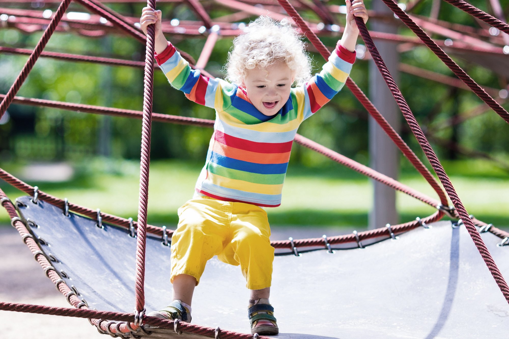 A small child on a climbing frame